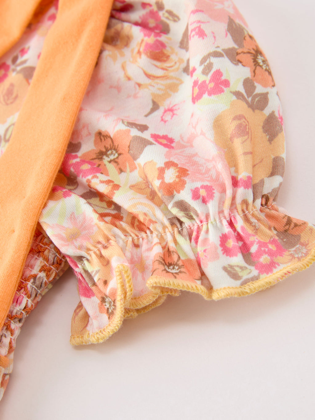 Peach Bow Smocked Floral Baby Bubble