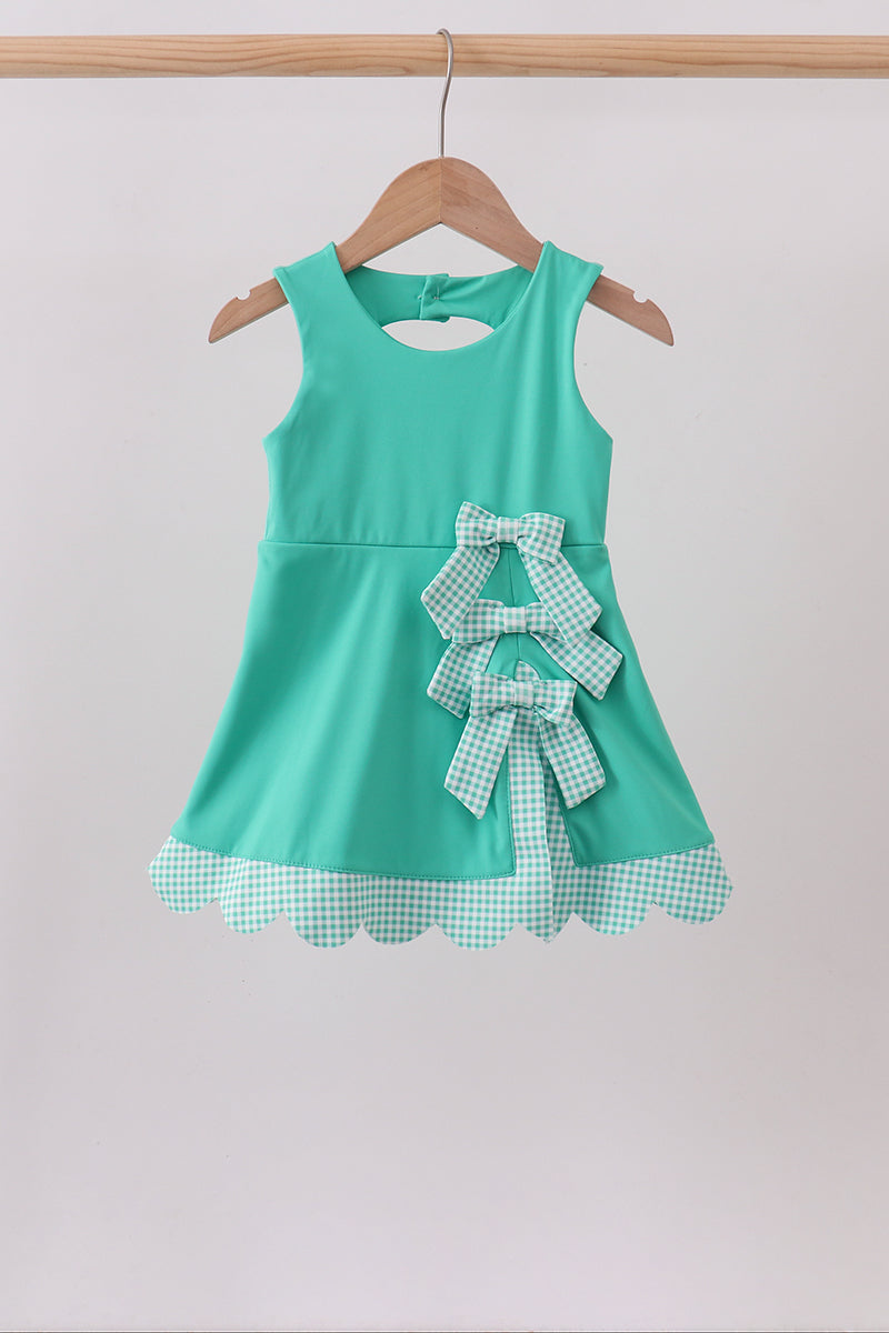 Green scalloped bow active dress