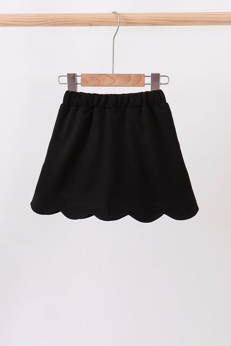 Black scallop hem bow skort